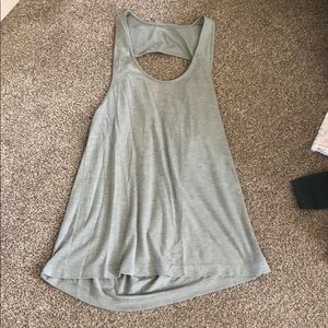 Alo green tank with open back.